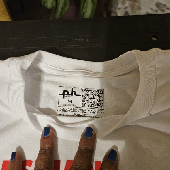 Size medium colorful tee-shirt and cup/soda holder. - Picture 2 of 4